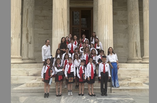 Psychico College Elementary School Choir performs at an environmental conference at the Academy of Athens