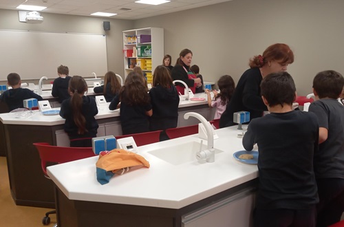 Athens College Grade 4 German class students made Christmas cookies