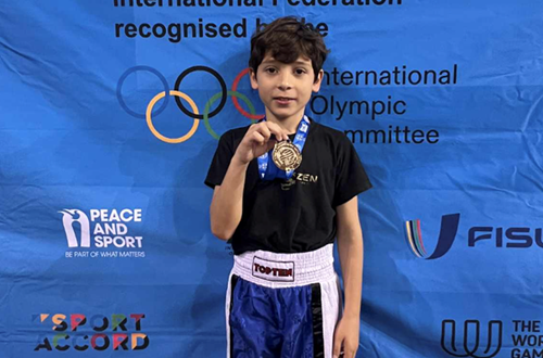 Athens College Elementary School - Gold medal for our student Thanos Minopoulos at the Panhellenic Kick Boxing - Point Fighting Championship