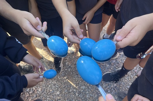 Athens College Elementary School - We exercise... in Spanish: an egg race full of smiles