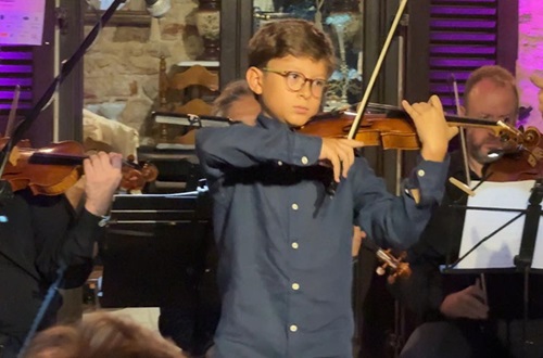 Student Nikolas Garoufalidis participates in Halki Music Festival along the Athens State Orchestra