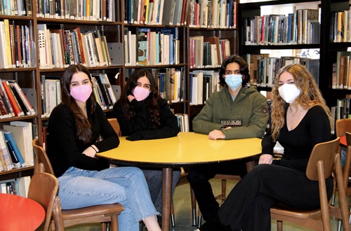 Four Athens College students in the 2022 National Debate Team